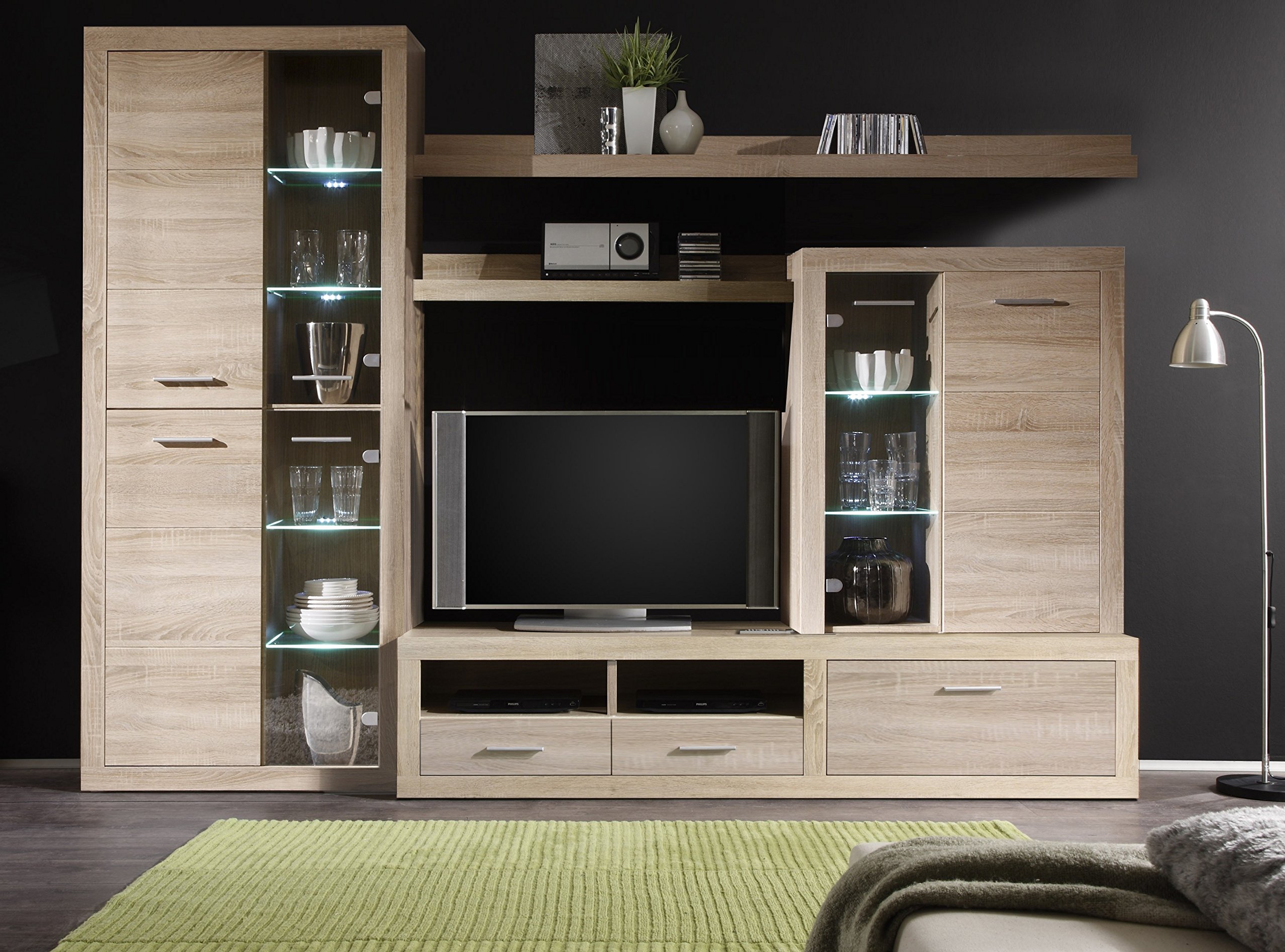 Bellissimo mobile per parete tv con vetrine decorate.