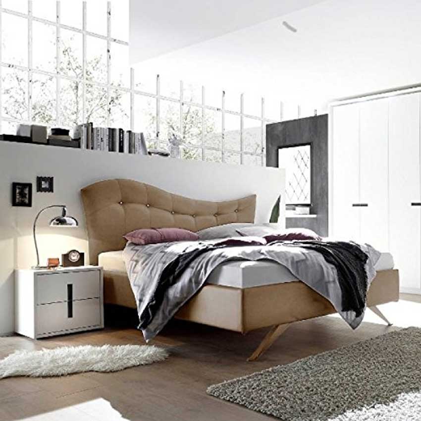 Camera da letto moderna con testiera beige design.