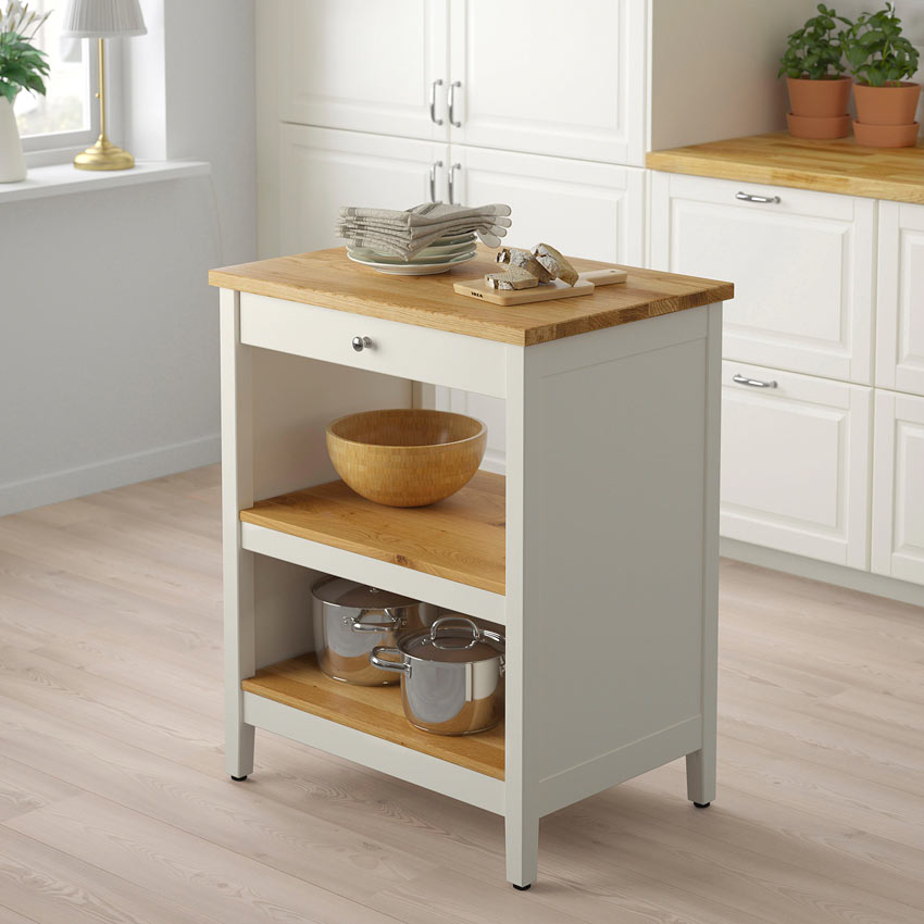 Piccola isola cucina IKEA bianca con top legno modello TORNVIKEN.