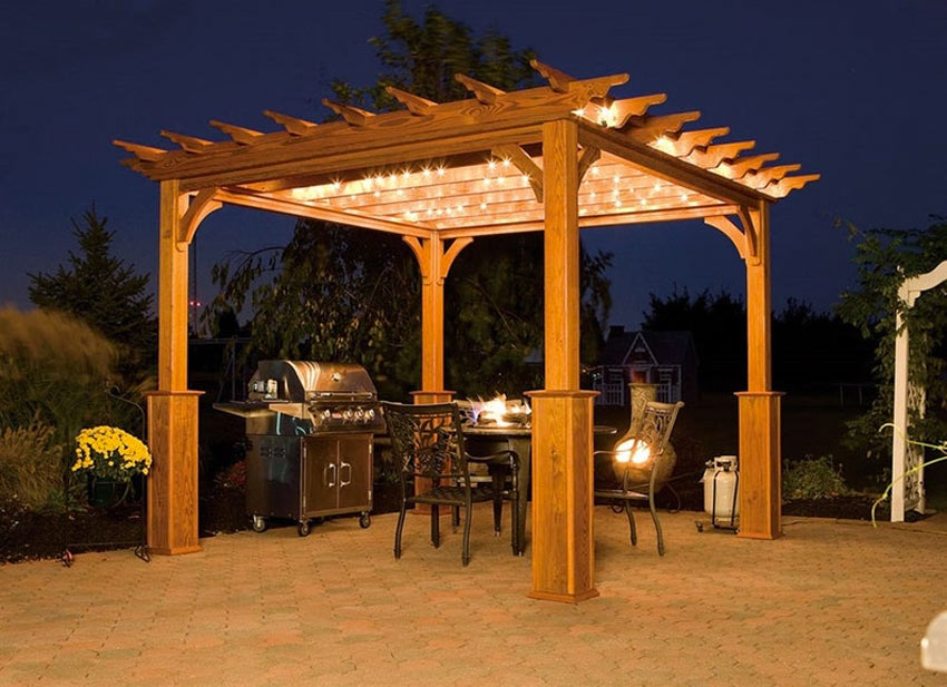 bellissima pergola di legno per il giardino con illuminazione