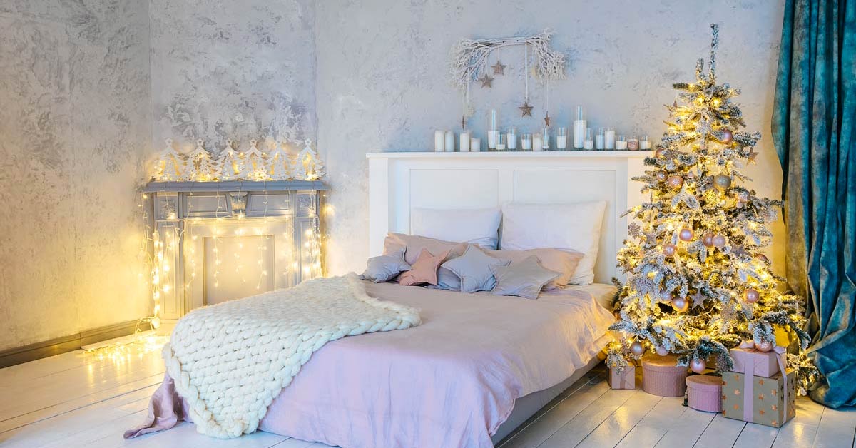 Come decorare l'albero di Natale in camera da letto.