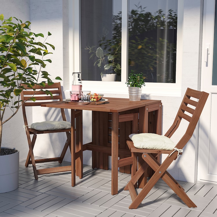 ÄPPLARÖ Tavolo+2 sedie pieghevoli giardino, mordente marrone/Kuddarna beige