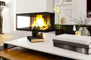 Camino ad angolo: l'arredo perfetto per un caldo relax in soggiorno Camino ad angolo, arredo soggiorno.