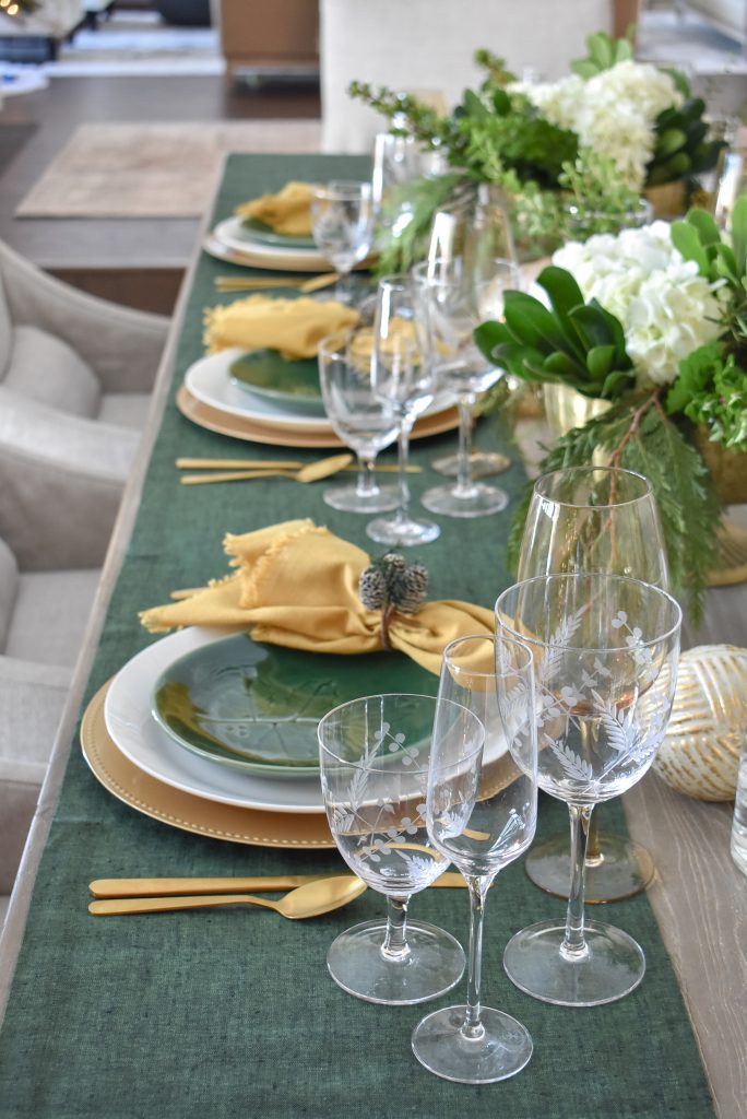 Simple Evergreen and Gold Christmas Table Setting with green table runners