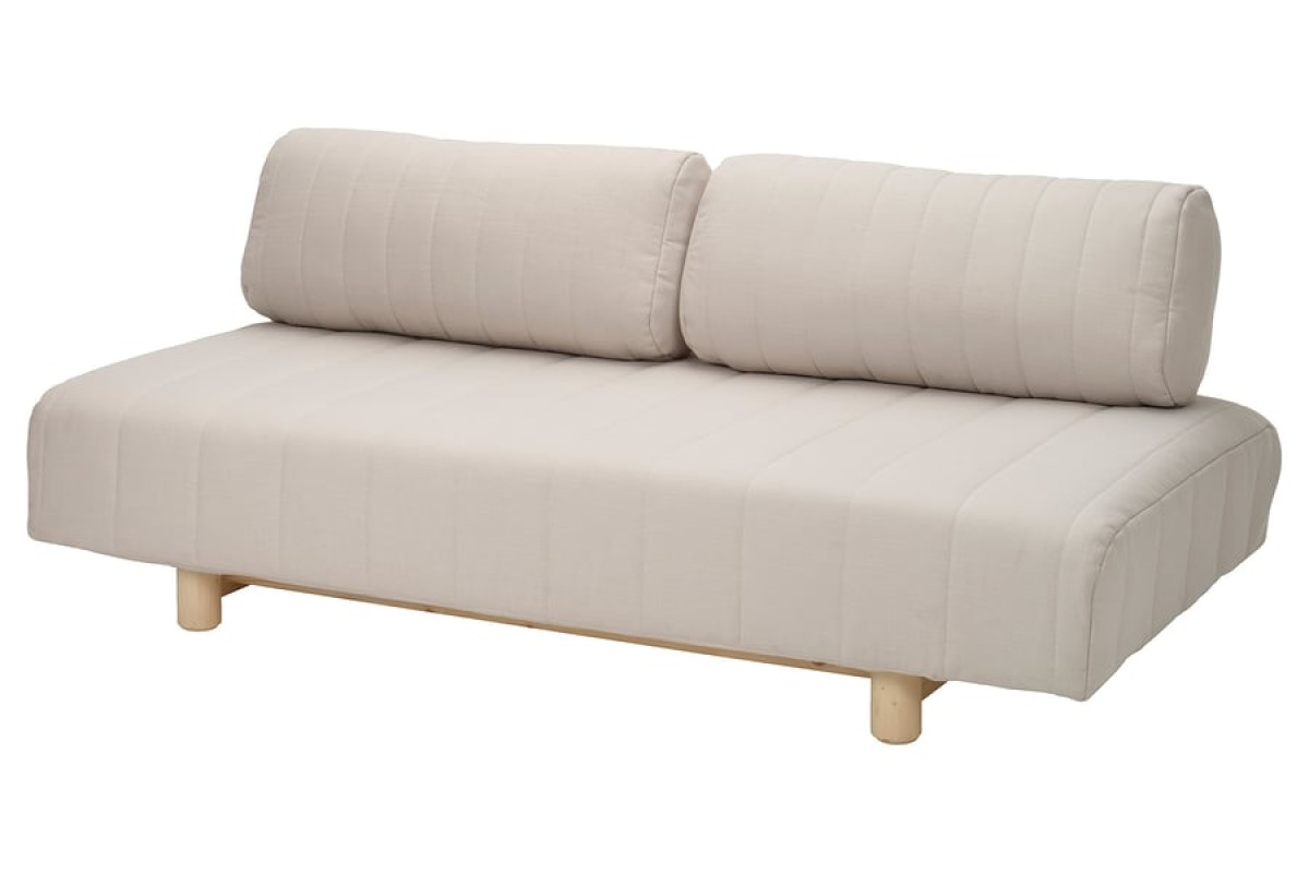 Divano letto IKEA PS 2026 grigio chiaro beige su fondo neutro
