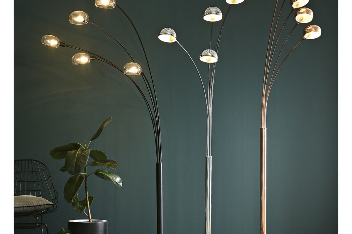 Versioni della lampada Octopus con bracci luminosi in ambiente scuro