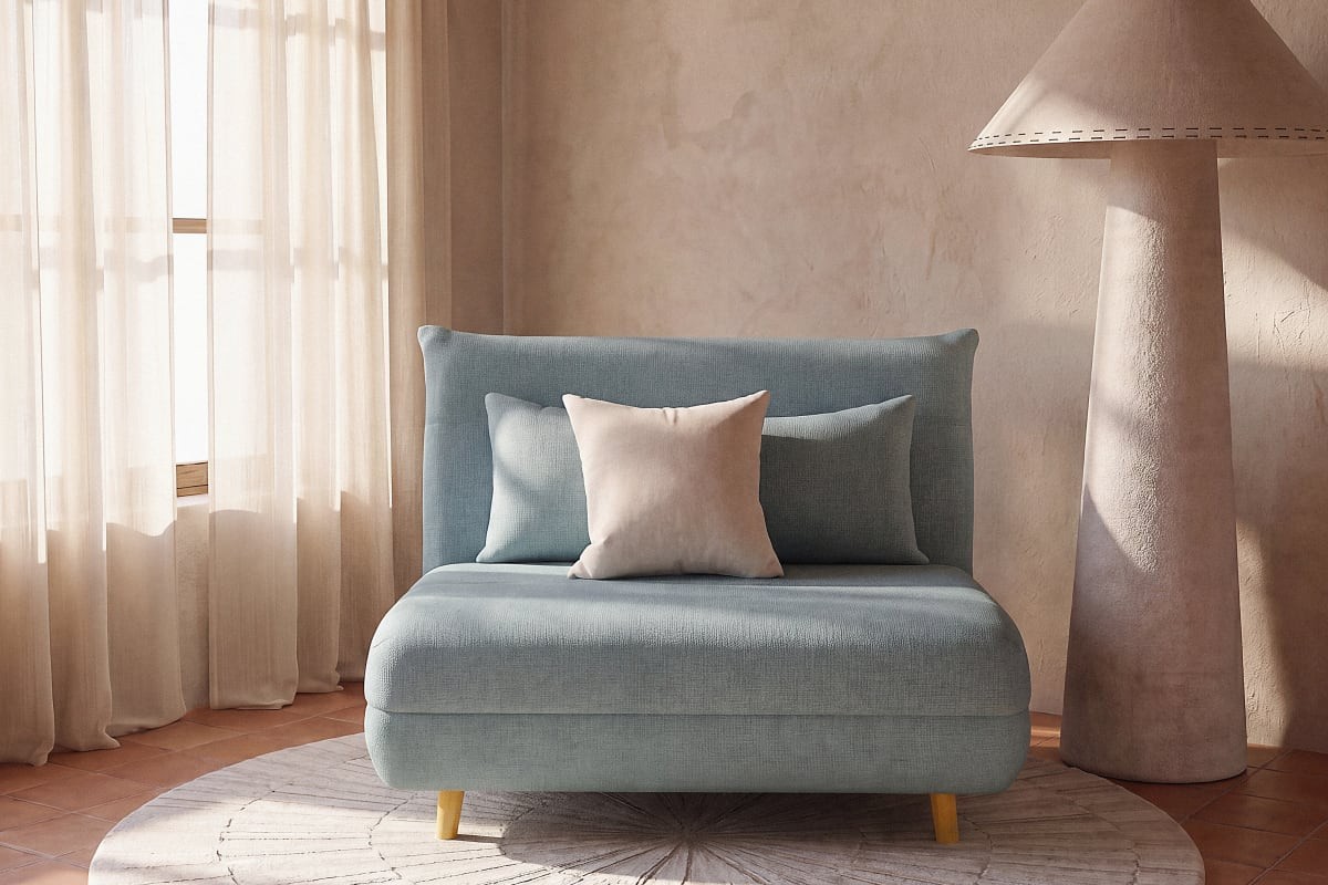 Poltrona letto verde acqua NIO Maisons du Monde in stanza luminosa