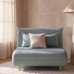 Poltrona letto verde acqua NIO Maisons du Monde in stanza luminosa