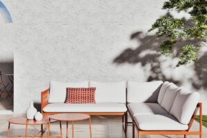Salotto da giardino AIREL Maisons du Monde color terracotta su terrazzo luminoso