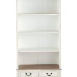 Libreria Léontine color crema ambientata in un soggiorno caldo