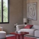 Tavolino bordeaux JUMBA Maisons du Monde al centro di un soggiorno contemporaneo
