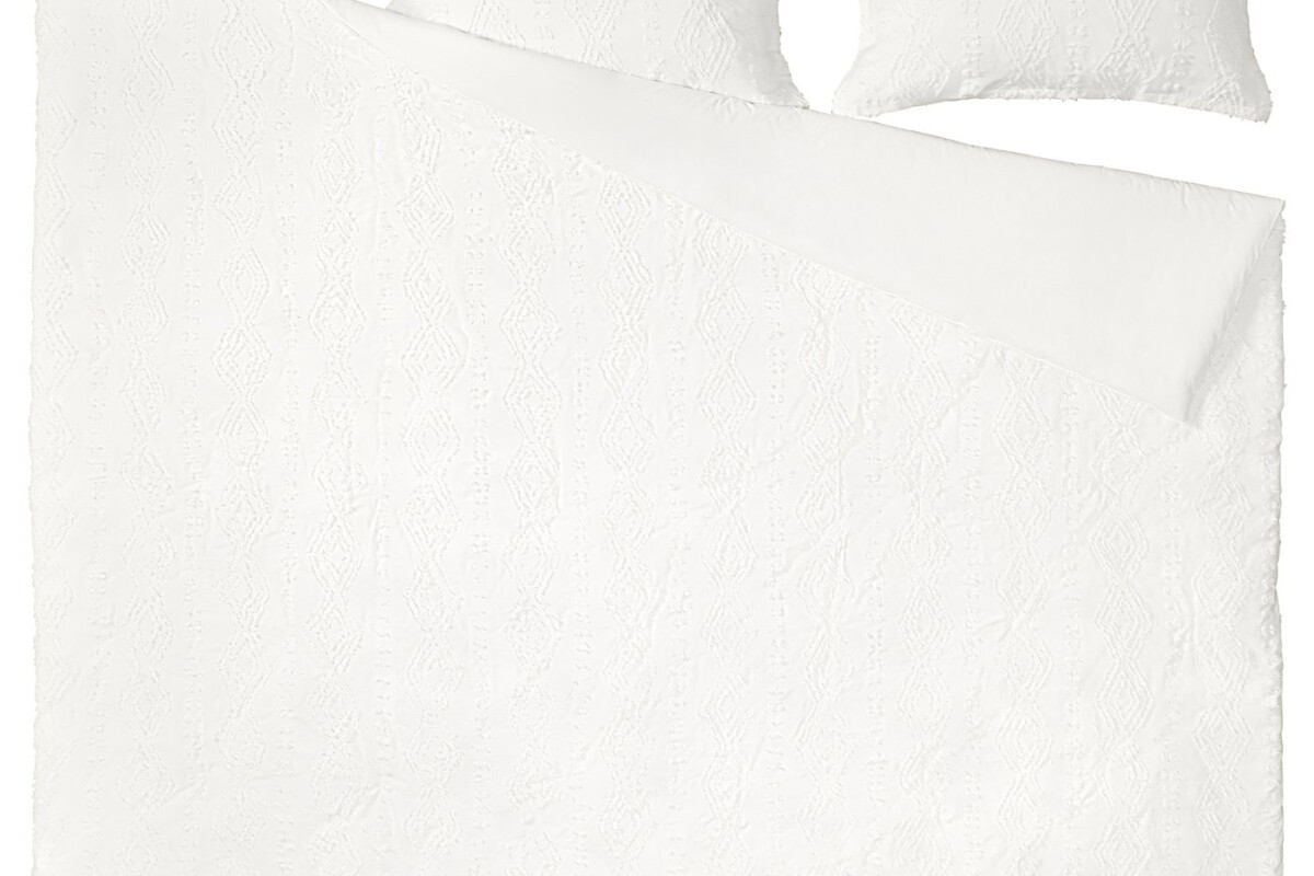 Dettaglio della texture a rombi della trapunta SVÄMNIL IKEA