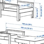 Poltrona letto TORNSBORG di IKEA in beige e pino in un angolo studio